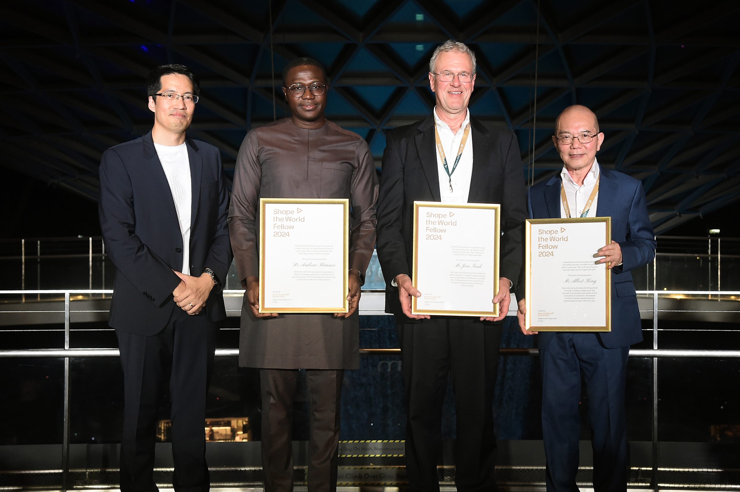 Mr. Lawrence Chong with the World Fellow Awardees